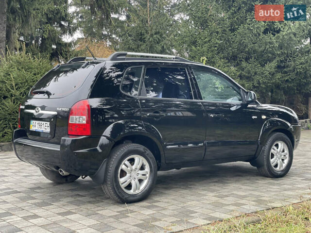 Черный Хендай Туксон, объемом двигателя 2 л и пробегом 180 тыс. км за 7700 $, фото 11 на Automoto.ua