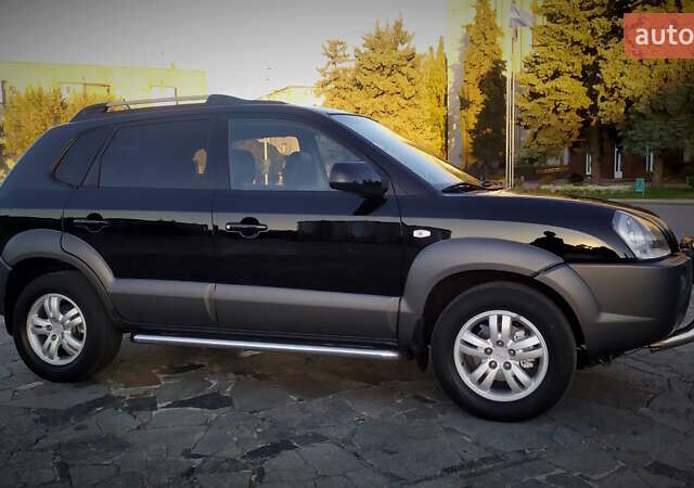 Черный Хендай Туксон, объемом двигателя 2 л и пробегом 230 тыс. км за 8600 $, фото 34 на Automoto.ua