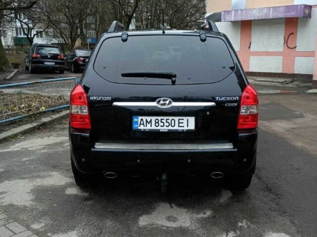 Черный Хендай Туксон, объемом двигателя 2 л и пробегом 200 тыс. км за 8300 $, фото 4 на Automoto.ua