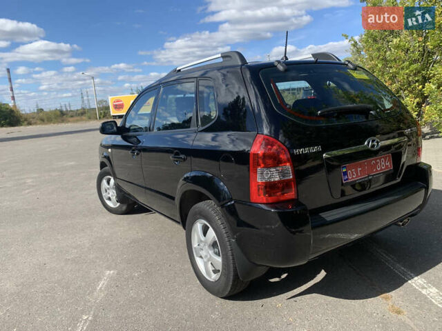 Чорний Хендай Туксон, об'ємом двигуна 2 л та пробігом 56 тис. км за 9500 $, фото 35 на Automoto.ua