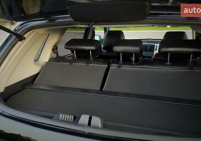 Черный Хендай Туксон, объемом двигателя 2 л и пробегом 230 тыс. км за 8600 $, фото 125 на Automoto.ua