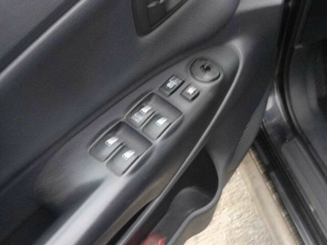 Черный Хендай Туксон, объемом двигателя 2 л и пробегом 200 тыс. км за 8300 $, фото 10 на Automoto.ua