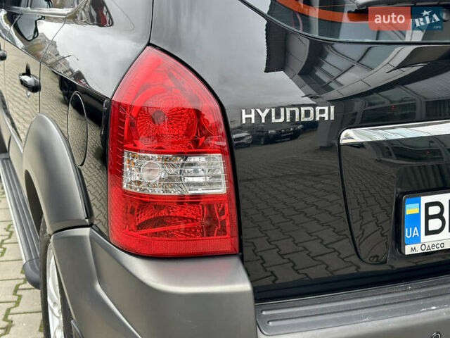 Чорний Хендай Туксон, об'ємом двигуна 2.66 л та пробігом 145 тис. км за 8900 $, фото 7 на Automoto.ua