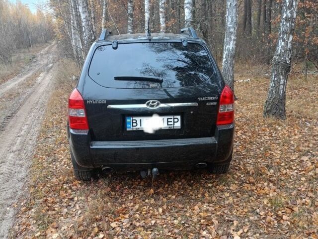 Черный Хендай Туксон, объемом двигателя 2 л и пробегом 240 тыс. км за 8800 $, фото 2 на Automoto.ua