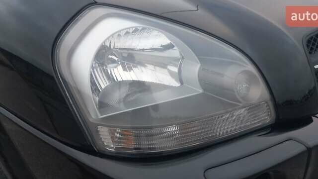 Черный Хендай Туксон, объемом двигателя 1.98 л и пробегом 155 тыс. км за 7999 $, фото 14 на Automoto.ua