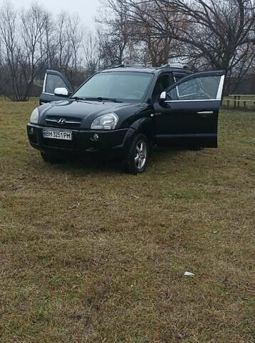 Чорний Хендай Туксон, об'ємом двигуна 2 л та пробігом 199 тис. км за 8300 $, фото 8 на Automoto.ua
