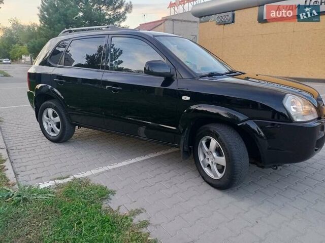 Чорний Хендай Туксон, об'ємом двигуна 1.98 л та пробігом 192 тис. км за 7950 $, фото 8 на Automoto.ua