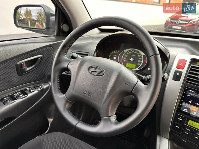 Хендай Туксон 2007 в Ужгороде на Automoto.ua Черный Хендай Туксон, объемом двигателя 1.98 л и пробегом 157 тыс. км за 7300 $, фото 3 на Automoto.ua