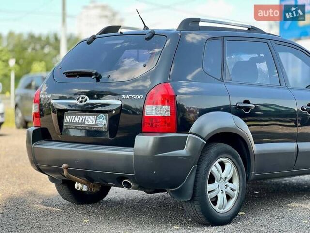 Черный Хендай Туксон, объемом двигателя 2 л и пробегом 227 тыс. км за 8200 $, фото 13 на Automoto.ua