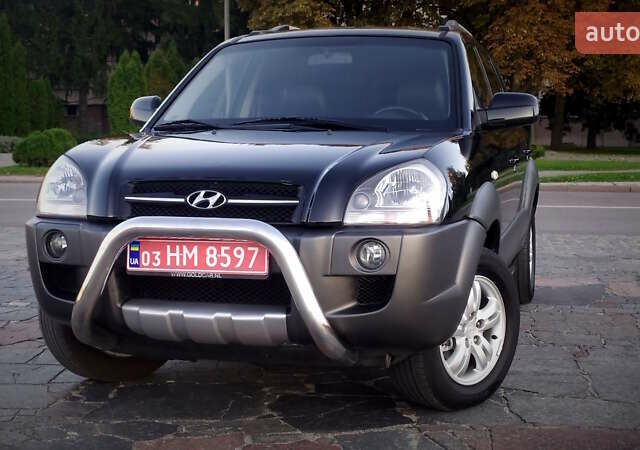 Черный Хендай Туксон, объемом двигателя 2 л и пробегом 230 тыс. км за 8600 $, фото 88 на Automoto.ua