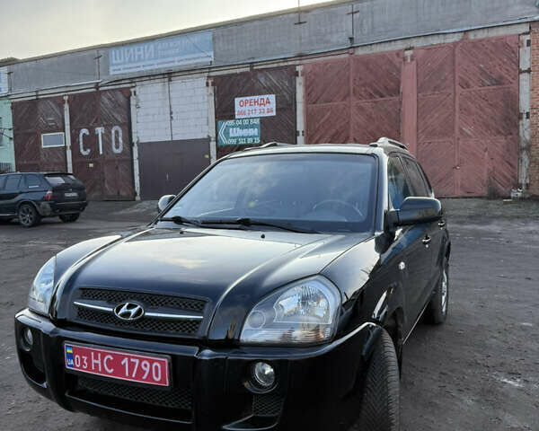 Черный Хендай Туксон, объемом двигателя 1.98 л и пробегом 230 тыс. км за 7750 $, фото 19 на Automoto.ua