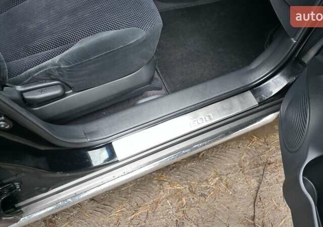 Чорний Хендай Туксон, об'ємом двигуна 2 л та пробігом 207 тис. км за 8200 $, фото 17 на Automoto.ua