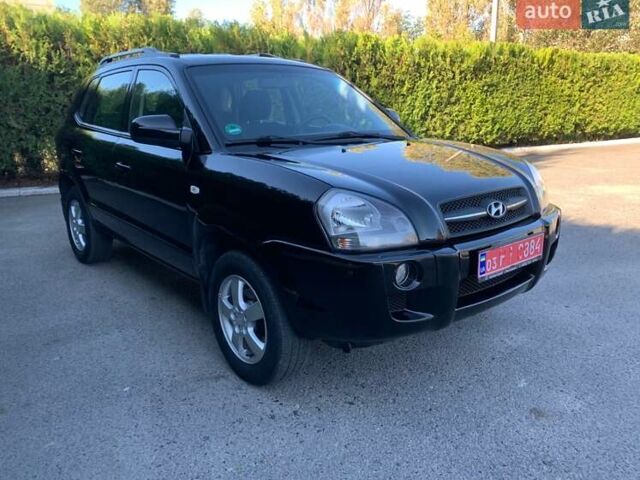 Чорний Хендай Туксон, об'ємом двигуна 2 л та пробігом 56 тис. км за 9500 $, фото 5 на Automoto.ua