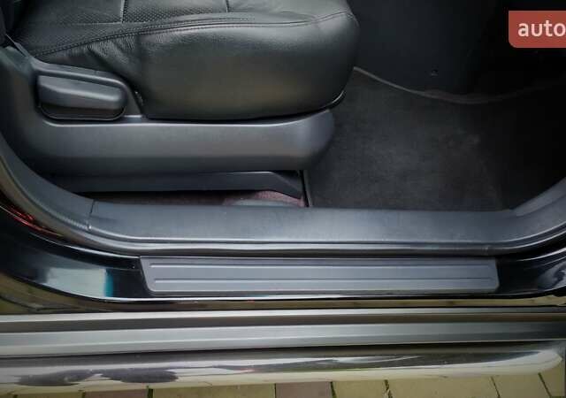 Чорний Хендай Туксон, об'ємом двигуна 2 л та пробігом 229 тис. км за 8600 $, фото 141 на Automoto.ua