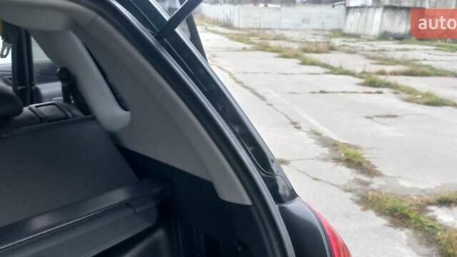 Черный Хендай Туксон, объемом двигателя 1.98 л и пробегом 155 тыс. км за 7999 $, фото 60 на Automoto.ua