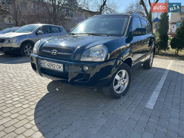 Чорний Хендай Туксон, об'ємом двигуна 2 л та пробігом 181 тис. км за 7799 $, фото 2 на Automoto.ua