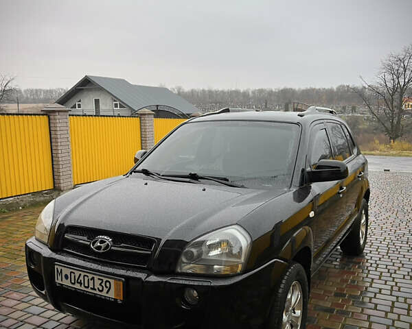 Черный Хендай Туксон, объемом двигателя 2 л и пробегом 151 тыс. км за 9100 $, фото 1 на Automoto.ua