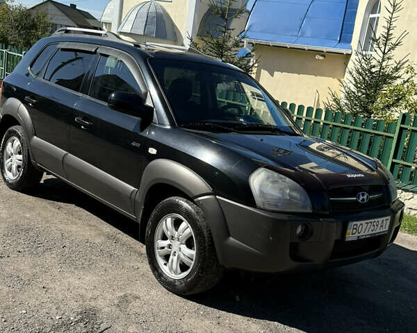 Черный Хендай Туксон, объемом двигателя 2 л и пробегом 294 тыс. км за 7500 $, фото 2 на Automoto.ua