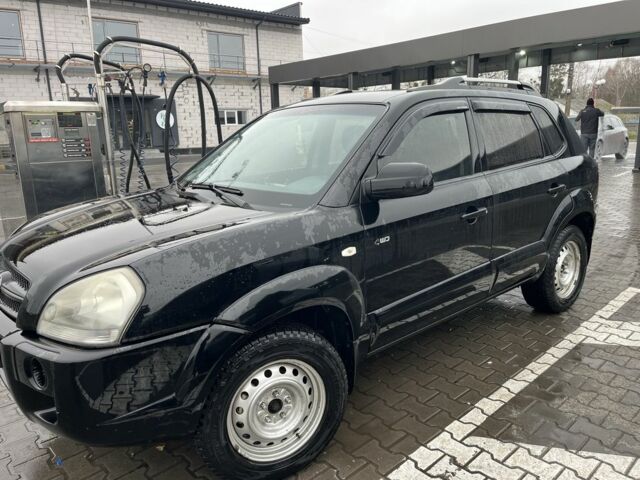 Черный Хендай Туксон, объемом двигателя 2 л и пробегом 177 тыс. км за 8500 $, фото 1 на Automoto.ua