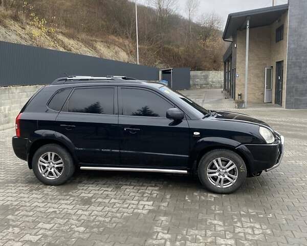 Чорний Хендай Туксон, об'ємом двигуна 1.99 л та пробігом 345 тис. км за 7600 $, фото 8 на Automoto.ua