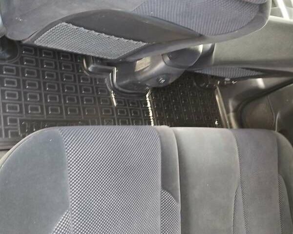 Черный Хендай Туксон, объемом двигателя 2 л и пробегом 270 тыс. км за 7500 $, фото 4 на Automoto.ua