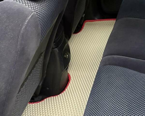 Черный Хендай Туксон, объемом двигателя 1.98 л и пробегом 273 тыс. км за 7400 $, фото 9 на Automoto.ua