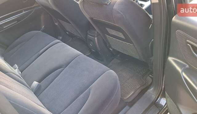 Черный Хендай Туксон, объемом двигателя 2 л и пробегом 190 тыс. км за 8150 $, фото 26 на Automoto.ua