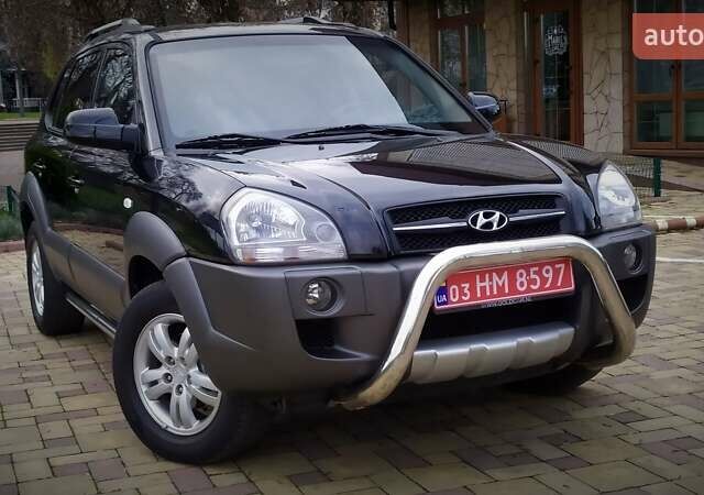 Чорний Хендай Туксон, об'ємом двигуна 2 л та пробігом 229 тис. км за 8600 $, фото 9 на Automoto.ua