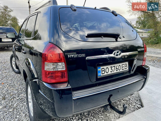 Черный Хендай Туксон, объемом двигателя 2 л и пробегом 224 тыс. км за 7750 $, фото 7 на Automoto.ua