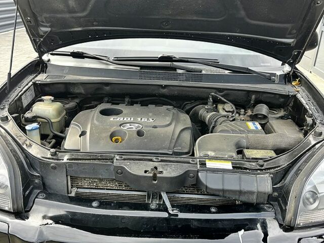 Чорний Хендай Туксон, об'ємом двигуна 2 л та пробігом 240 тис. км за 8600 $, фото 10 на Automoto.ua