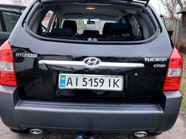 Черный Хендай Туксон, объемом двигателя 2 л и пробегом 272 тыс. км за 7500 $, фото 8 на Automoto.ua