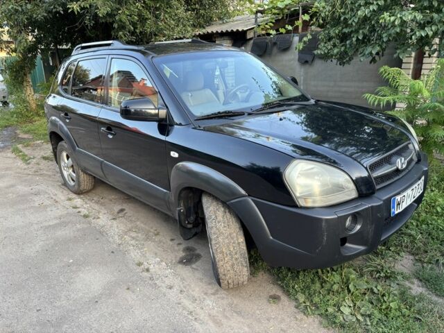 Чорний Хендай Туксон, об'ємом двигуна 2 л та пробігом 330 тис. км за 3700 $, фото 3 на Automoto.ua