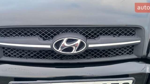 Черный Хендай Туксон, объемом двигателя 1.98 л и пробегом 155 тыс. км за 7999 $, фото 16 на Automoto.ua