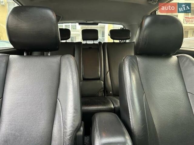 Черный Хендай Туксон, объемом двигателя 1.98 л и пробегом 147 тыс. км за 8000 $, фото 24 на Automoto.ua