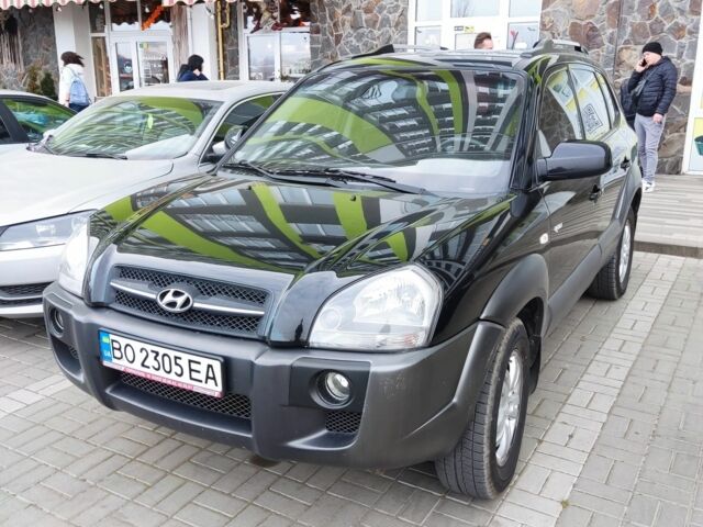 Черный Хендай Туксон, объемом двигателя 2 л и пробегом 250 тыс. км за 7900 $, фото 5 на Automoto.ua