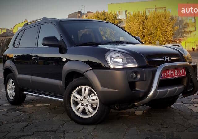 Черный Хендай Туксон, объемом двигателя 2 л и пробегом 230 тыс. км за 8600 $, фото 30 на Automoto.ua