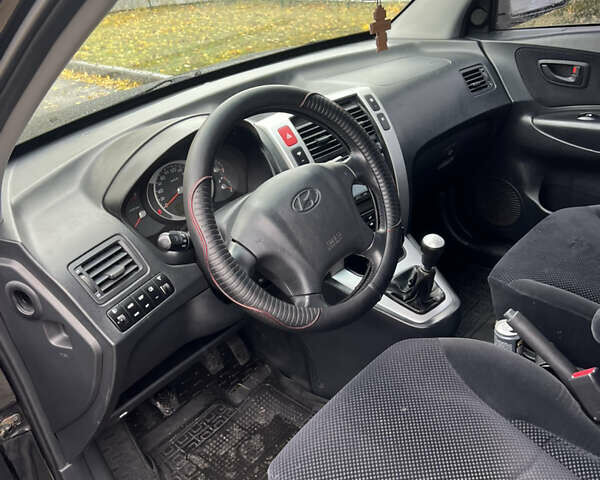 Хендай Туксон 2007 в Каменское - Днепродзержинск на Automoto.ua Черный Хендай Туксон, объемом двигателя 1.98 л и пробегом 162 тыс. км за 7999 $, фото 7 на Automoto.ua