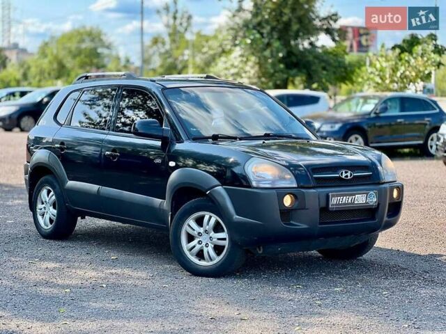 Черный Хендай Туксон, объемом двигателя 2 л и пробегом 227 тыс. км за 8200 $, фото 7 на Automoto.ua