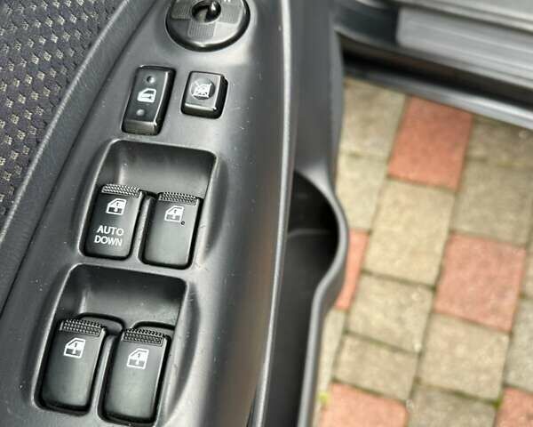 Черный Хендай Туксон, объемом двигателя 2 л и пробегом 218 тыс. км за 7600 $, фото 26 на Automoto.ua