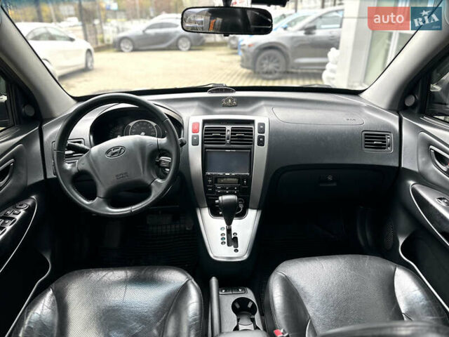 Чорний Хендай Туксон, об'ємом двигуна 2.66 л та пробігом 145 тис. км за 8900 $, фото 12 на Automoto.ua