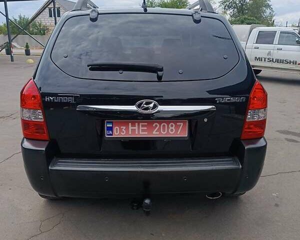 Черный Хендай Туксон, объемом двигателя 2 л и пробегом 255 тыс. км за 8400 $, фото 13 на Automoto.ua