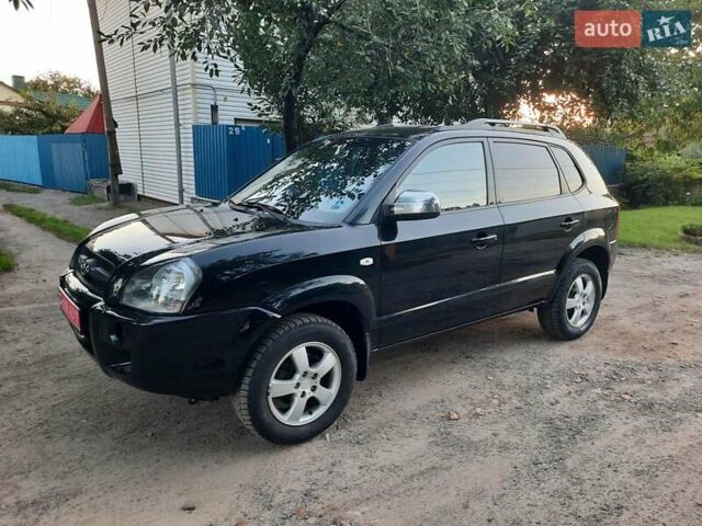 Черный Хендай Туксон, объемом двигателя 2 л и пробегом 219 тыс. км за 7990 $, фото 40 на Automoto.ua