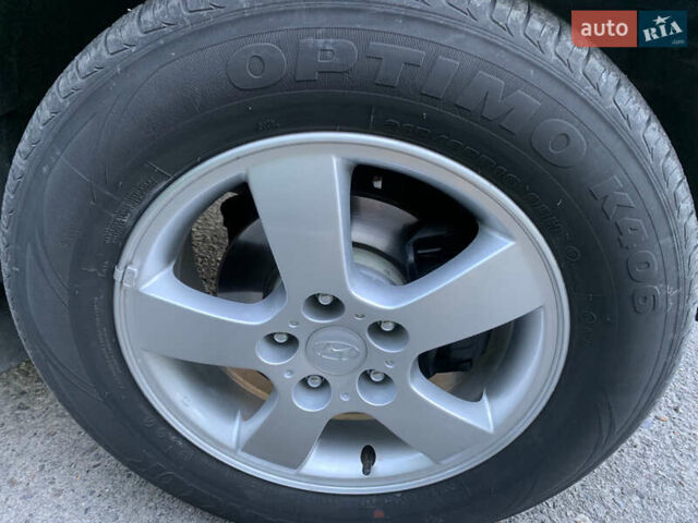 Чорний Хендай Туксон, об'ємом двигуна 2 л та пробігом 56 тис. км за 9500 $, фото 1 на Automoto.ua