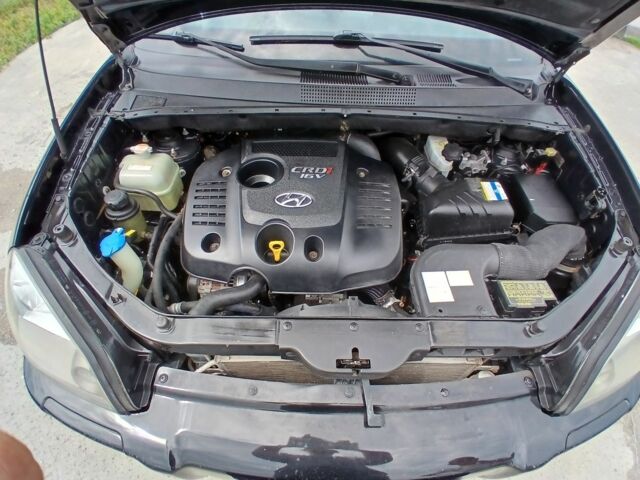 Чорний Хендай Туксон, об'ємом двигуна 2 л та пробігом 235 тис. км за 8000 $, фото 7 на Automoto.ua