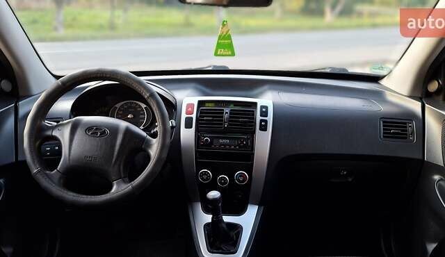 Черный Хендай Туксон, объемом двигателя 2 л и пробегом 190 тыс. км за 8150 $, фото 30 на Automoto.ua