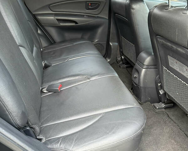 Черный Хендай Туксон, объемом двигателя 1.98 л и пробегом 159 тыс. км за 7600 $, фото 35 на Automoto.ua