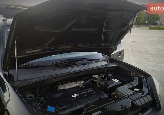 Черный Хендай Туксон, объемом двигателя 2 л и пробегом 230 тыс. км за 8600 $, фото 202 на Automoto.ua
