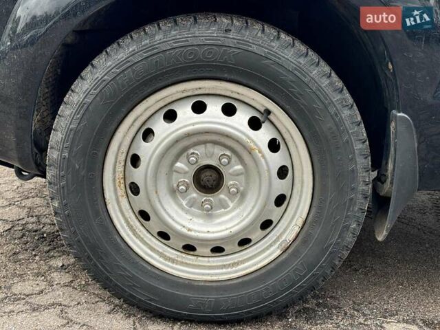 Черный Хендай Туксон, объемом двигателя 2 л и пробегом 177 тыс. км за 8940 $, фото 11 на Automoto.ua