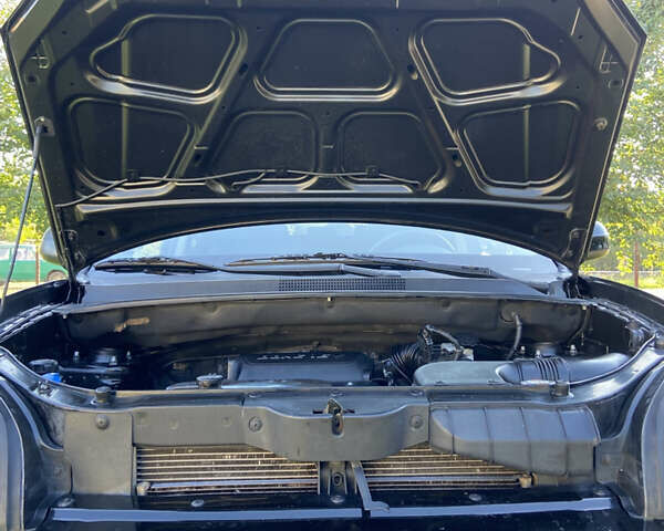 Черный Хендай Туксон, объемом двигателя 1.98 л и пробегом 197 тыс. км за 8000 $, фото 55 на Automoto.ua