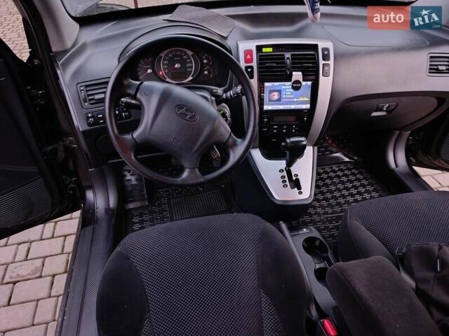 Черный Хендай Туксон, объемом двигателя 2 л и пробегом 280 тыс. км за 9500 $, фото 35 на Automoto.ua